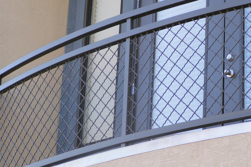 Architectural Woven Wire Mesh On Railings For A Balcony from Direct Metals