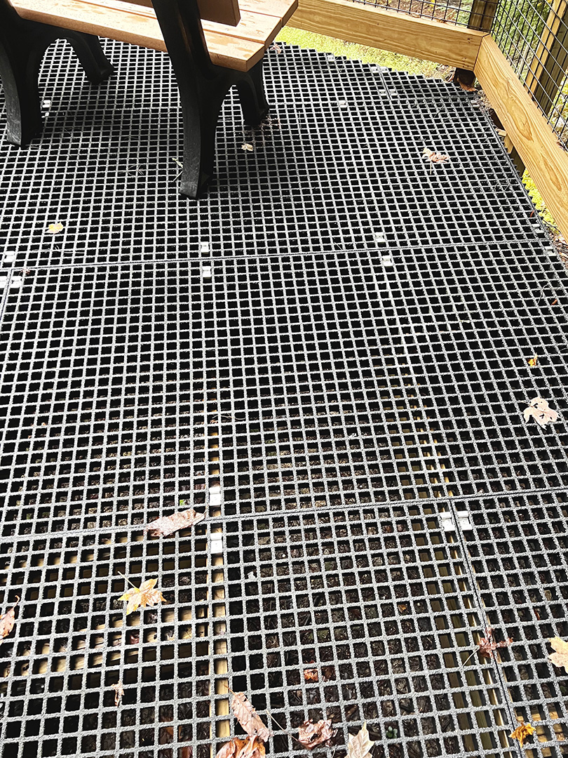 A fiberglass grating platform at a park, similar to products from Direct Metals®, the best place to buy fiberglass grating.